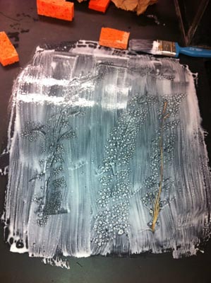 glueprint: glue spread on table showing imprint of dried plant